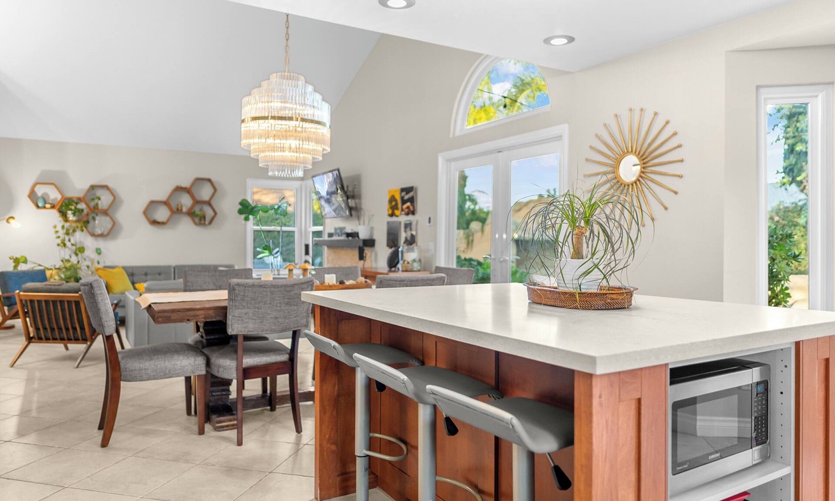 Corona House | Enjoy a comfortable 3-bedroom home in Corona featuring a private pool with a waterslide, outdoor kitchen, fire pit, and dedicated workspaces. Designed for 30+ day stays, this home is ideal for relocation guests, insurance housing, corporate travelers