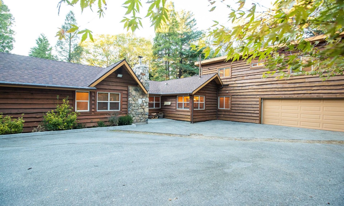 Cedarpines Park Cabin | Secluded cabin on 20 beautiful, wooded acres. Hot tub, 3 fireplaces, pool table.