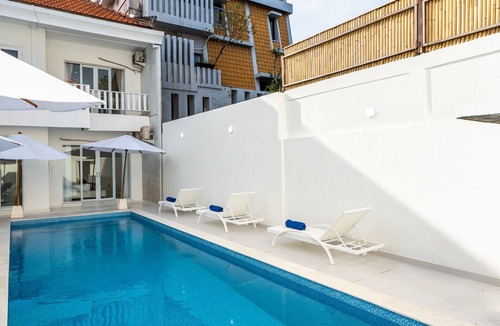 Dewi Sri Villa | 5 Star Luxury Minimalist Villa White Angel in Seminyak, for 21 people in total