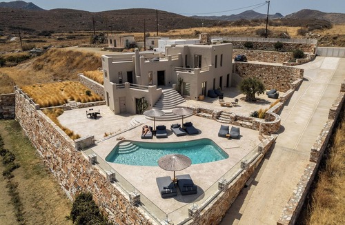 Naxos Villa | A private sanctuary above the Aegean . Sunlight, stillness, and the olive grove