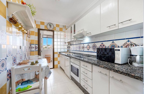 Fuengirola Apartment | Beautiful Adriana Apartment with Pool, Air Conditioning, Wi-Fi, Balcony, Terrace, Stunning Views