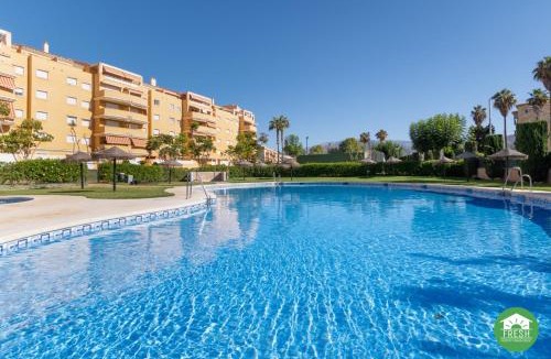 Mezquitilla Apartment | Casa Mariposa: 2BR Apt with Pool Steps from Beach