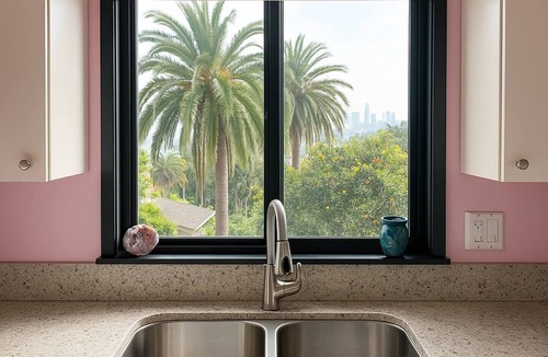 Elysian Heights House | Charming Echo Park bungalow with DTLA views! Steps from Elysian Park & Dodger Stadium, this gallery & artist retreat blends vintage charm with modern comfort. Once home to painter Barbara Romain, now lovingly preserved by Boho House Collective.