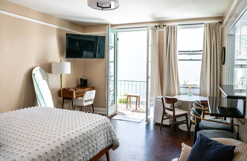 East Village Apartment | Chic Condo w Parking, AC and steps to Beach and Convention Center