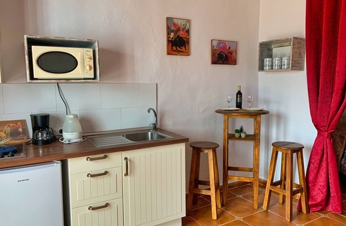 Benamocarra Apartment | Comfortable studio in a country house with pool close to the sea