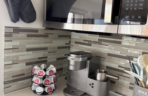 Vernon Apartment | Cozy 2-bedroom corner unit skyrise apartment with city views