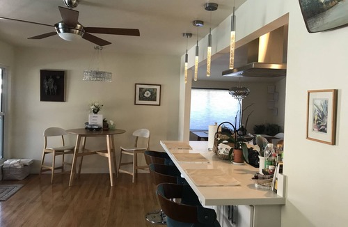 Redding House | Cozy mid century house with pool, hot tub, Dish Tv, WiFi, fireplace, waterfall