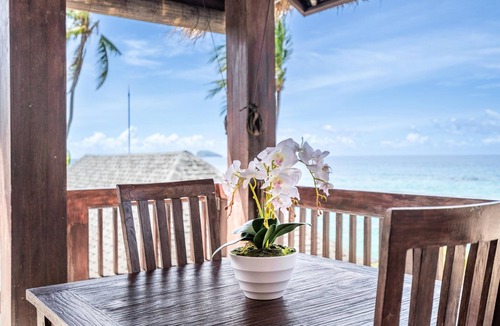 Candi Dasa Apartment | Deluxe Room with Balcony and Ocean View | The Village of Angels Resort