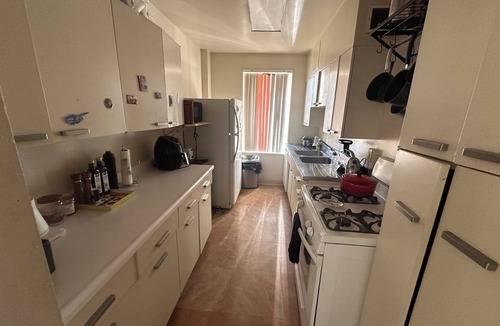 La Brea Apartment | Enchanting 2-bedroom apt with 2 private garage parking in the heart of Weho BH