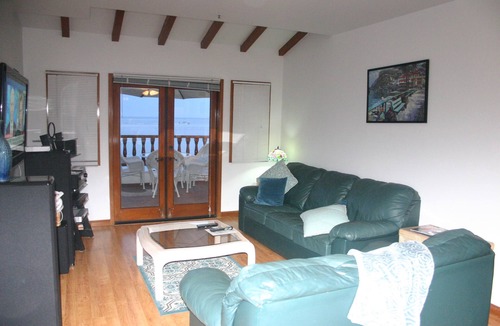 Avalon Villa | HAMCOVE BestBldg Best View/OCEANFRONT/GOLFCART/SMART TV A/C,25 yards to ocean!