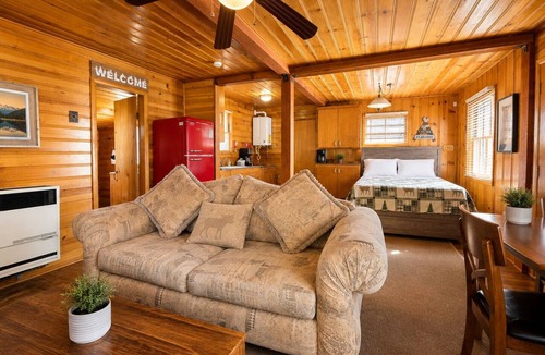 The Village House | Highland Hideaway - Walk to Lake & Village, Pet Friendly, Fenced Yard