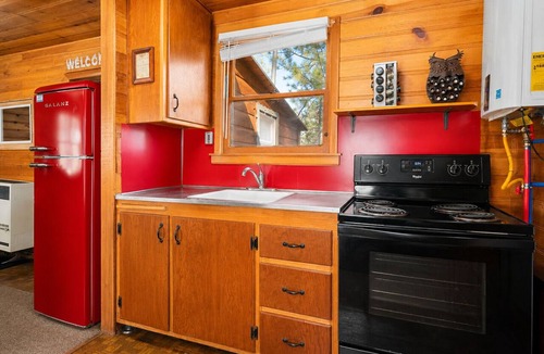 The Village House | Highland Hideaway - Walk to Lake & Village, Pet Friendly, Fenced Yard