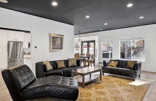 The Village Ski Chalet | Hillside Hideaway ~ Dog-friendly home with wraparound deck, grill, game room, & bar - walk to dining