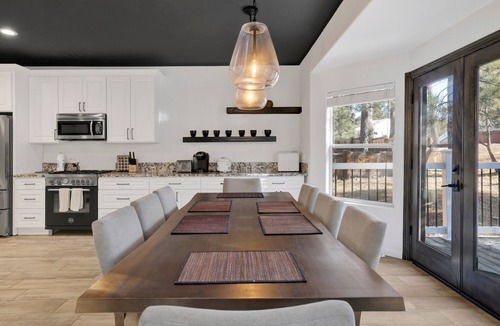 The Village Ski Chalet | Hillside Hideaway ~ Dog-friendly home with wraparound deck, grill, game room, & bar - walk to dining