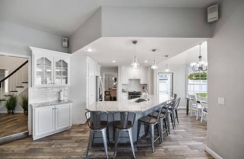 Visalia Villa | Inspired by the iconic white buildings and turquoise waters of Greece.