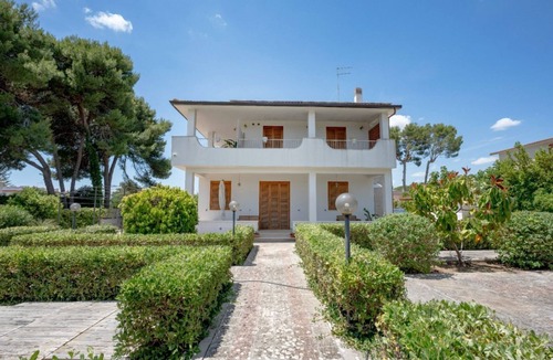 Monti D'arena-Bosco Caggione Apartment | Large studio apartment perfect for two people, is located in a shared villa but has its own private access. It features a shared garden and a large furnished patio for exclusive use. The accommodation is located in Marina di Pulsano, a well-served seasid