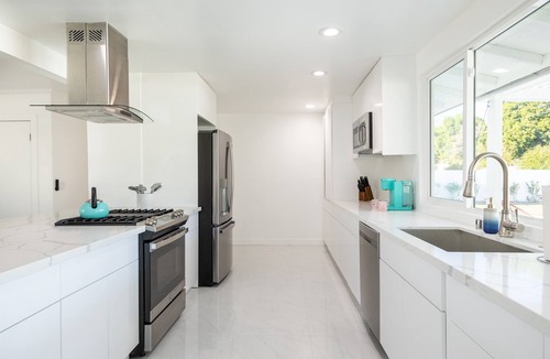 Chino Canyon Villa | Lounging on Sunshine! Heated Saltwater Pool&Spa, PetFriendly, ExpensiveLush Yard