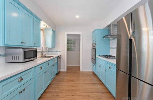 Carlsbad Village House | Relax by the fire pit and hammock. Enjoy the King bed en suite.