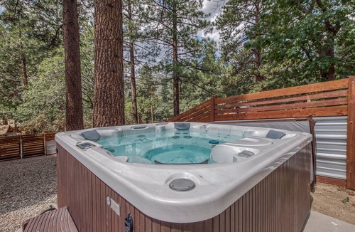 Fern Valley House | Stunning Fern Valley cabin with forest views & private hot tub - dog-friendly