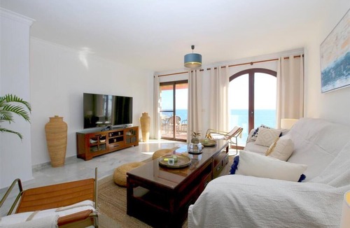 La Gaspara Apartment | Stylish beachfront apartment with air con and Wifi, Beachfront and short drive to town and port