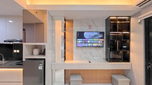 Tetebatu Apartment | The Luxury Studio at Delft Ciputra Makassar Apartment By Travelio