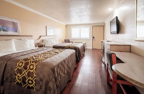 Corcoran Hotel | Welcoming Guest Room with Private Bath and Microwave, Perfect for Quick Escapes