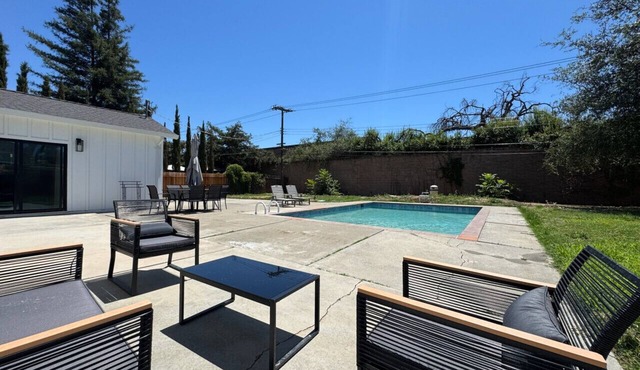 4BR · Pool · Fenced Yard · Garage · Tree-Lined Street