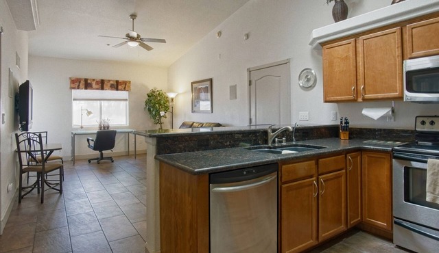 Beautiful 1 Bdrm Villa! Overlooks Pool with 44' Deep 13'6" High Attached Garage