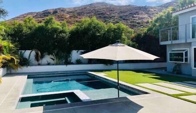 Bright and spacious home with views, pool & spa.