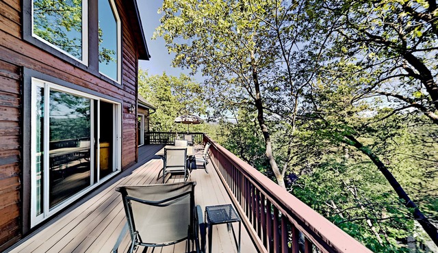 Custom timberline lodge near lake with fireplaces, decks, & pool table