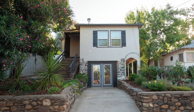 Downtown Cottage Style Home! Vintage vibes and comfortable amenities.