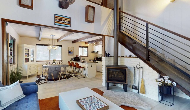 Family-friendly cabin with fireplace, bikes, loft, games, & skiing nearby