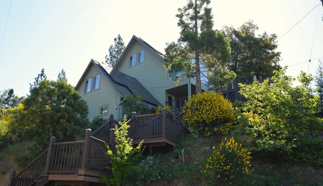 Longview Home: Multi-level home in a lakeside community with a Private Beach Club and private dock