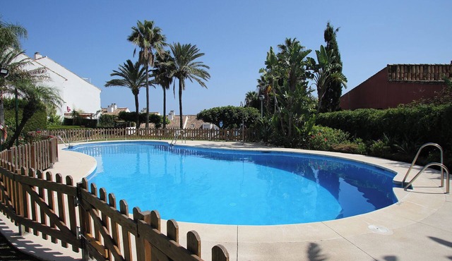Lovely 3 bedroom townhouse by the beach near Estepona w shared pool and garden
