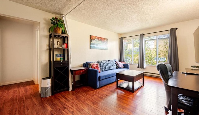 Modern One Bedroom Unit, Sofa Bed, Adjustable Queen Bed, 75 Inch Smart TV and Indoor Secure Parking