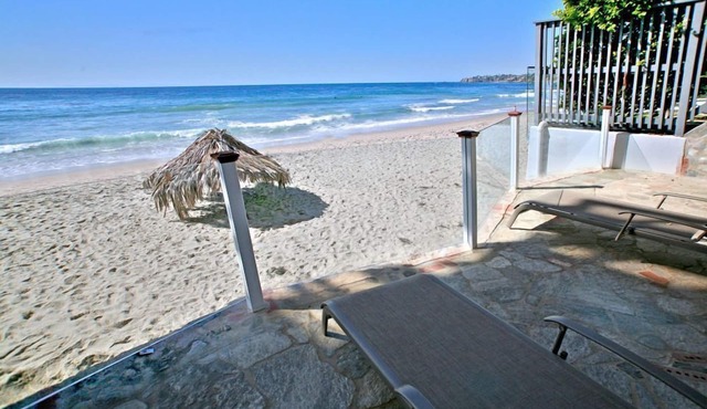 Oceanfront Cottage is on the sand in heart of Laguna Beach Village