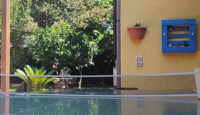 Scario villa with large garden.