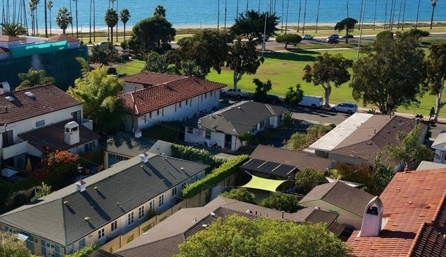 Steps to the Sand: Enjoy beach views & a private fenced yard. Great for families