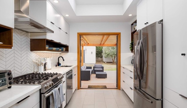 Upscale Home with Backyard Studio, Hot Tub & Gym