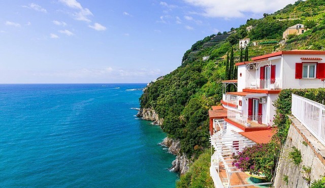 Villa Furina: A bright and sunny four-story villa built on the sloping cliff in front of the sea, with Free WI-FI.