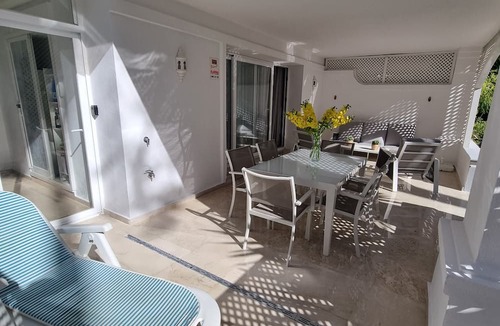 New Golden Mile Apartment | First Line ground floor App. with garden, 6 people, directly at sea and pool.