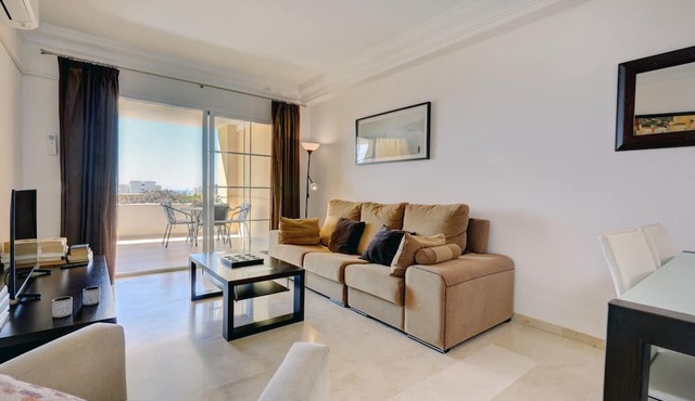 Spacious Holiday Apartment 'Puerto Alto' with Sea Views, Shared Pool & Wi-Fi